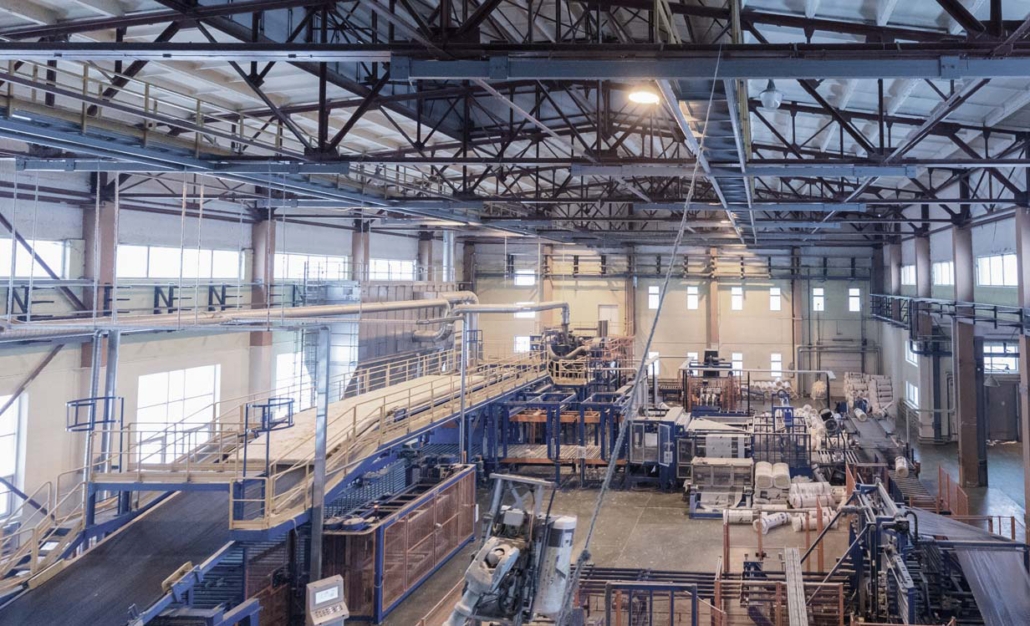 Fiberglass production industry equipment at manufacture backgrou
